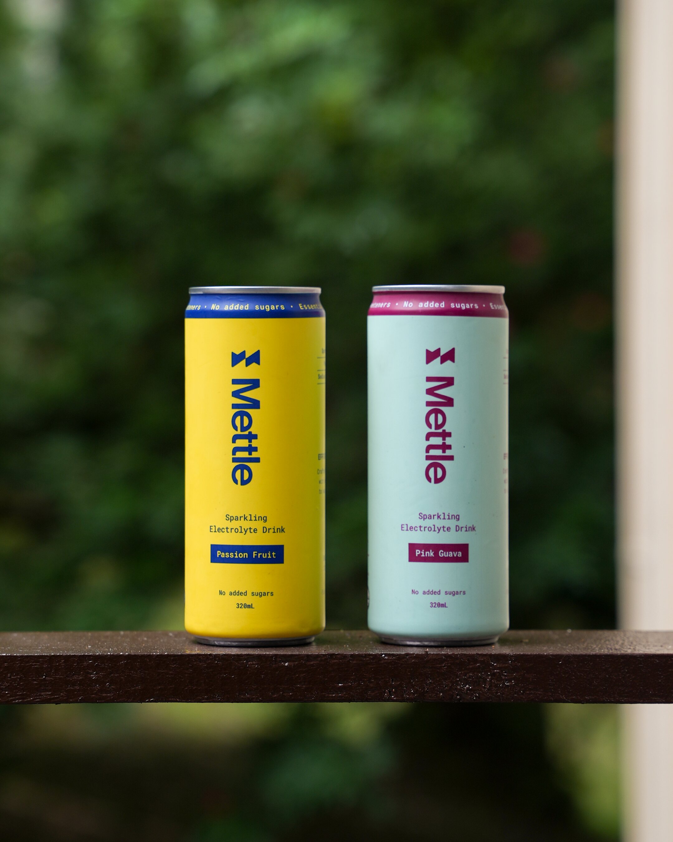 Mettle cans on a railing